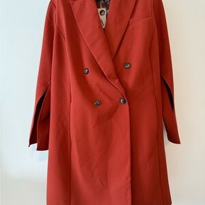 Elegant Double-Breasted Rust Trench Coat with the European flair!